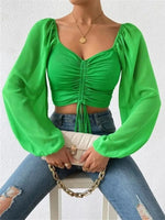 Mesh top met V-hals en lange mouwen Dames
