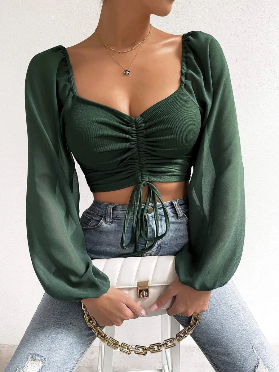 Mesh top met V-hals en lange mouwen Dames