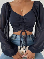 Mesh top met V-hals en lange mouwen Dames