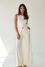 Tweedelige set met gilet en wijde pantalon Dames