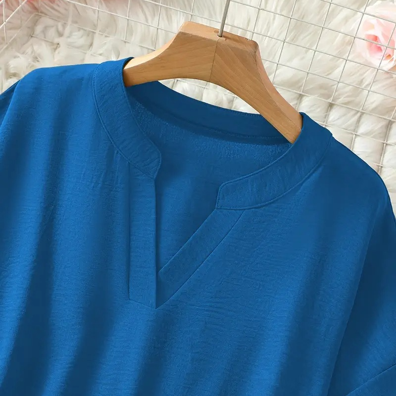 Losvallende blouse met V-hals Dames